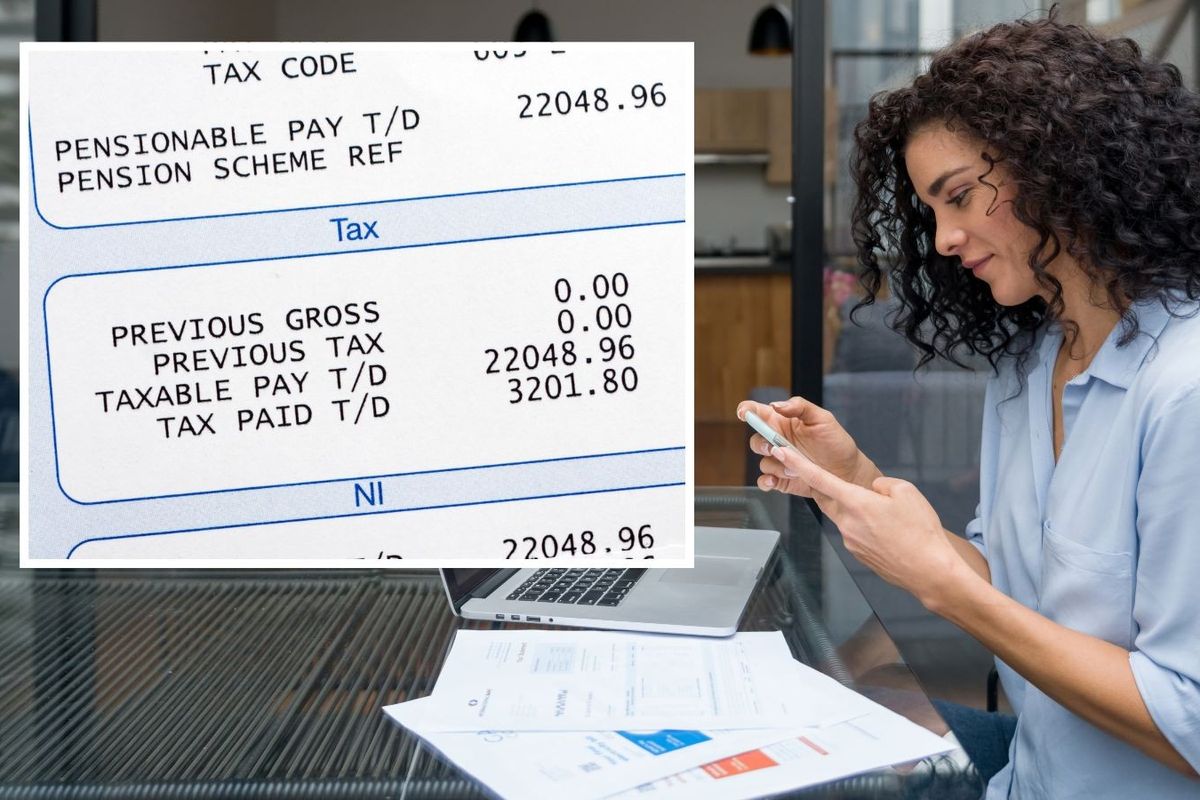 Person looks at mobile and documents beside image of payslip