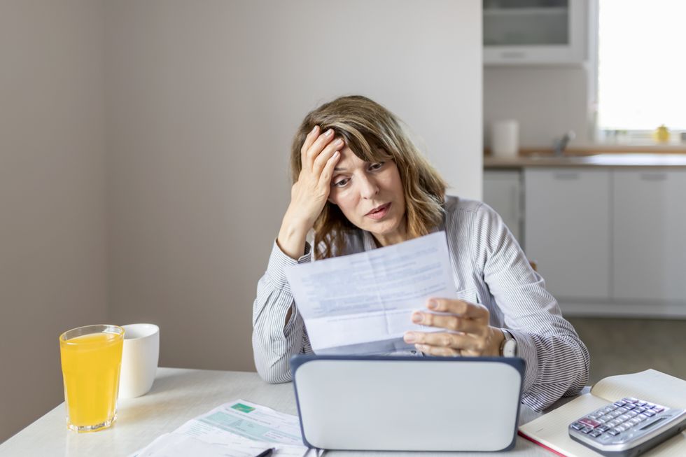 Person looks worried about finances
