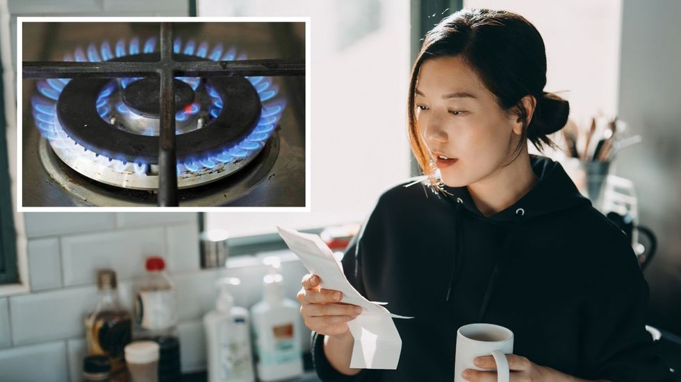Person looks worried at energy bills and gas hob in pictures