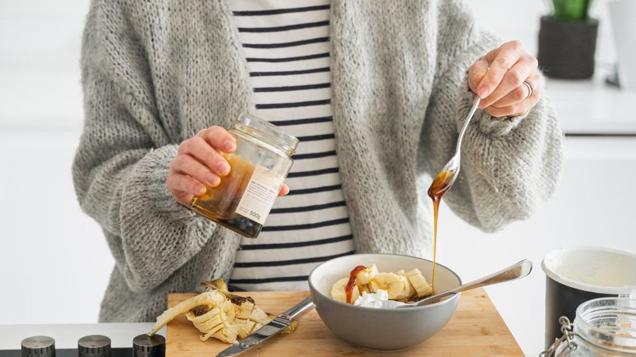 PERSON MAKING BREAKFAST