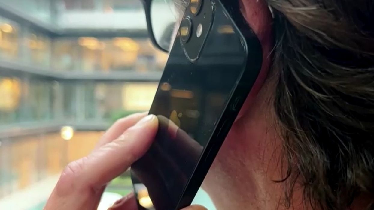 Person on iPhone 12