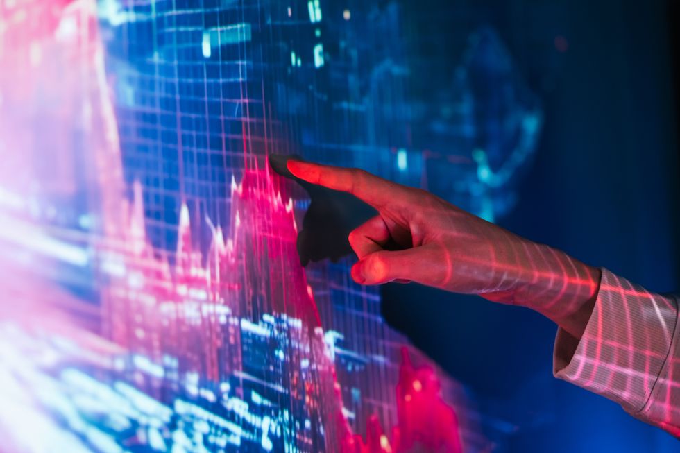Person pointing at a scanner