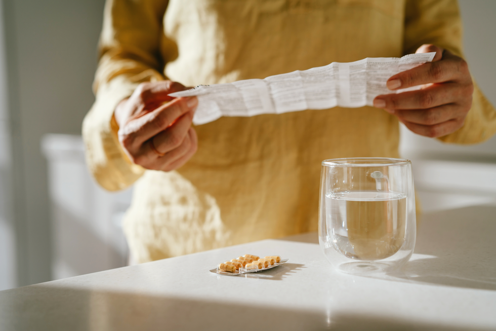 Person studying supplements