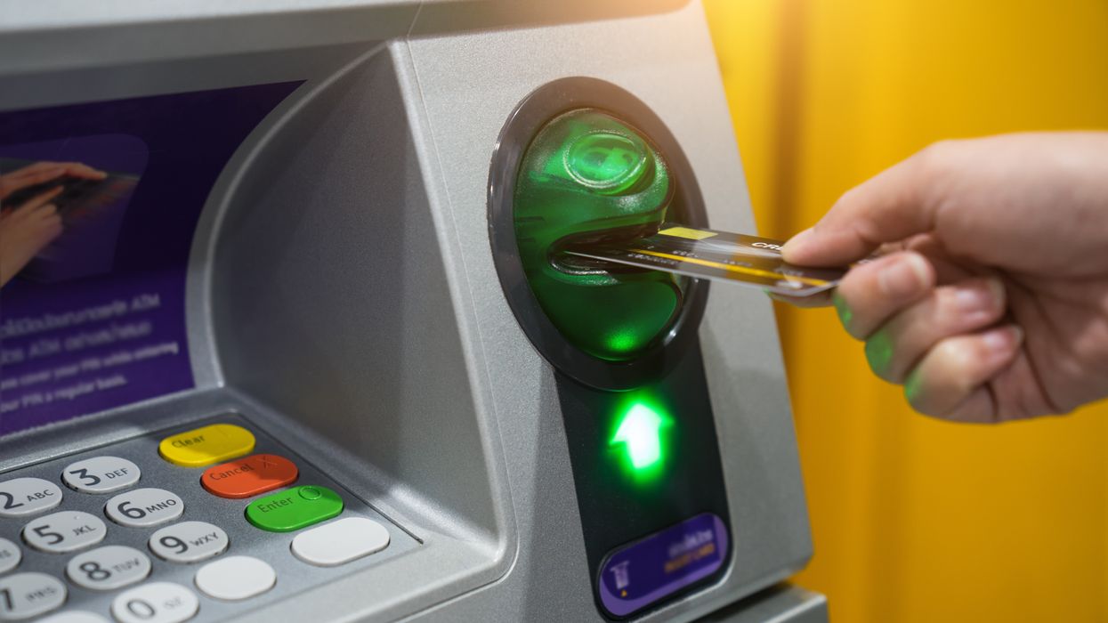Person using ATM