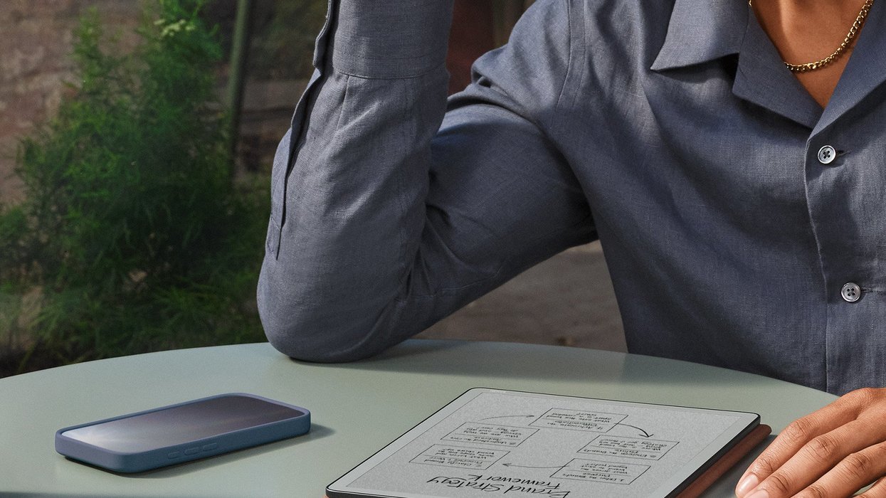 Person using Kindle Scribe without light
