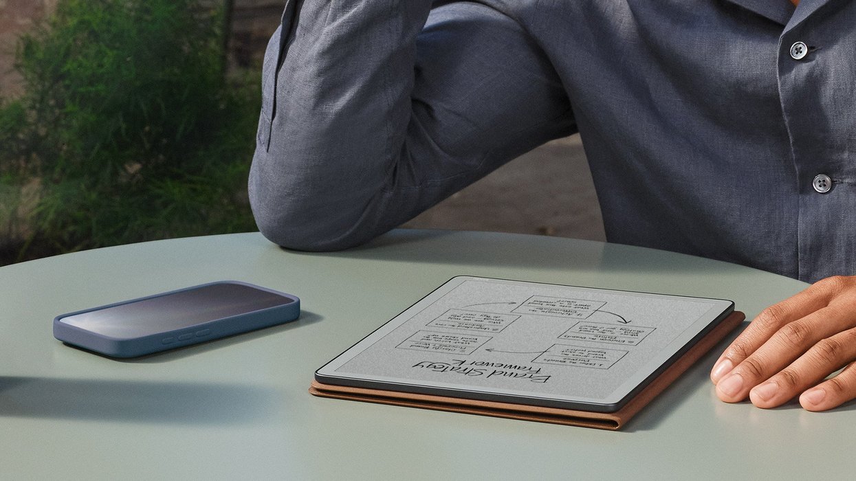 Person using Kindle Scribe without light