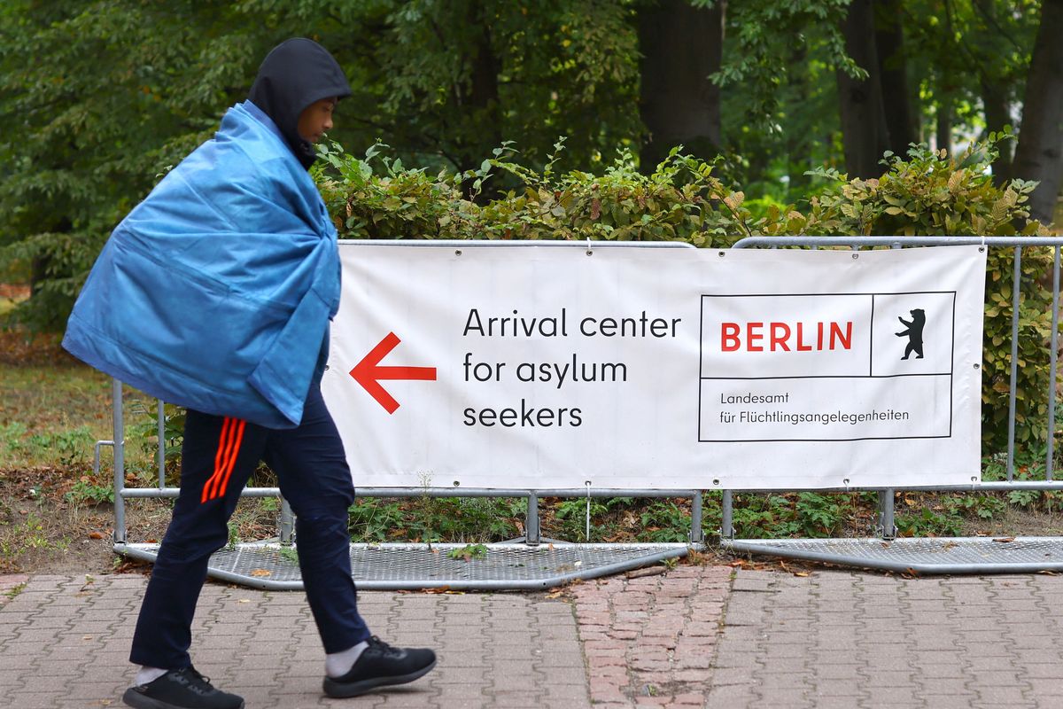 Person walking near an asylum seeker centre