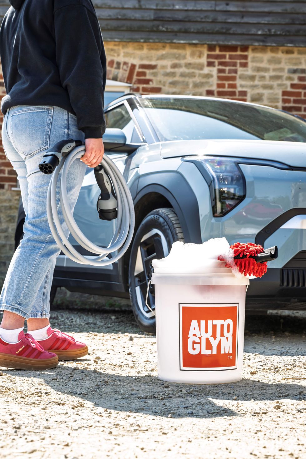 Person washing a car