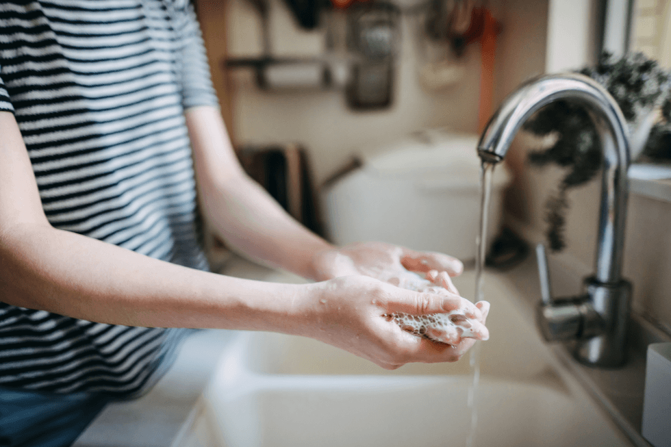 Person washing their hands