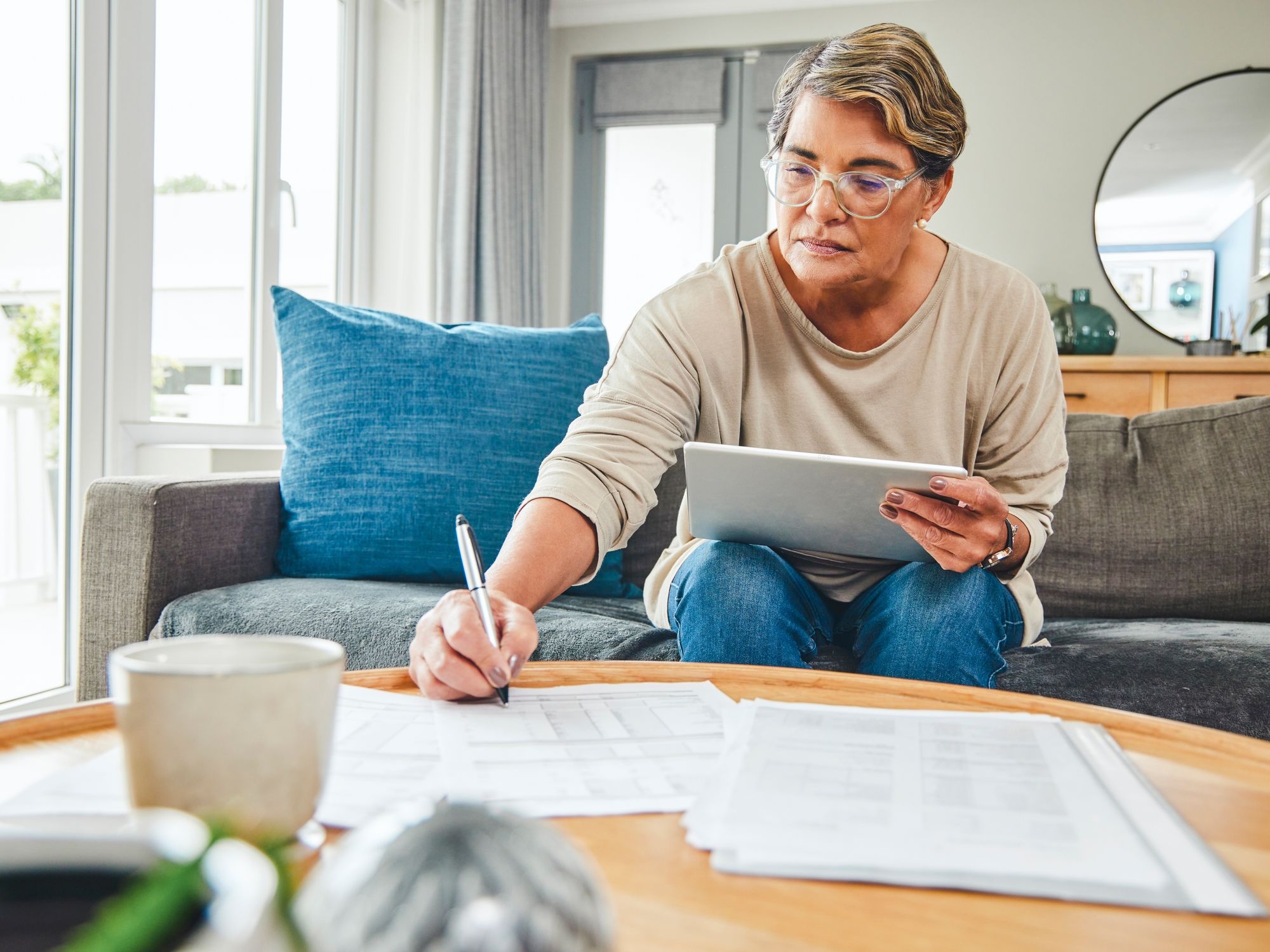 Person writing letter while planning how to reduce inheritance tax