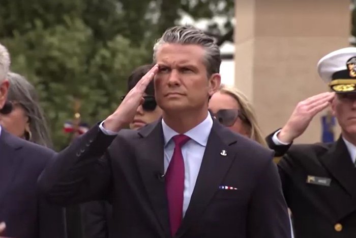 Pete Hegseth saluting at D-Day commemorations