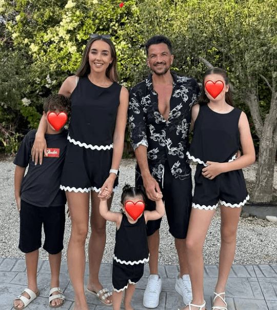 Peter and Emily Andre with their children