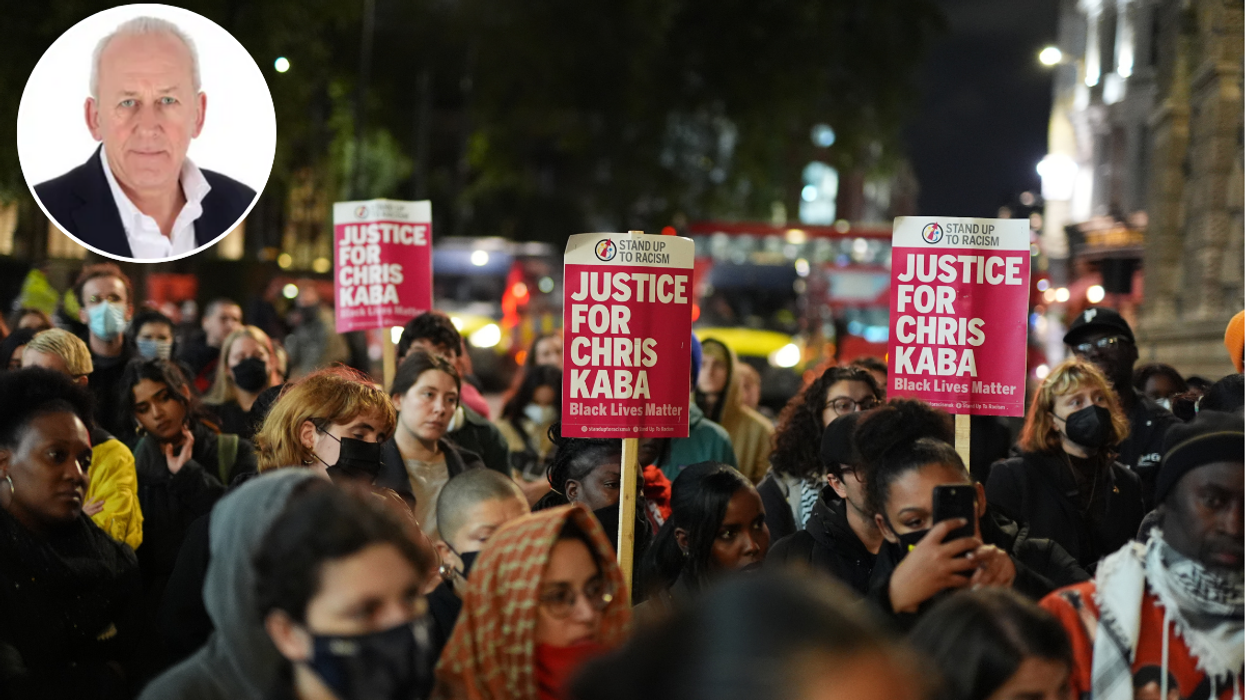 Peter Bleksley and people demonstrate outside the Old Bailey in central London