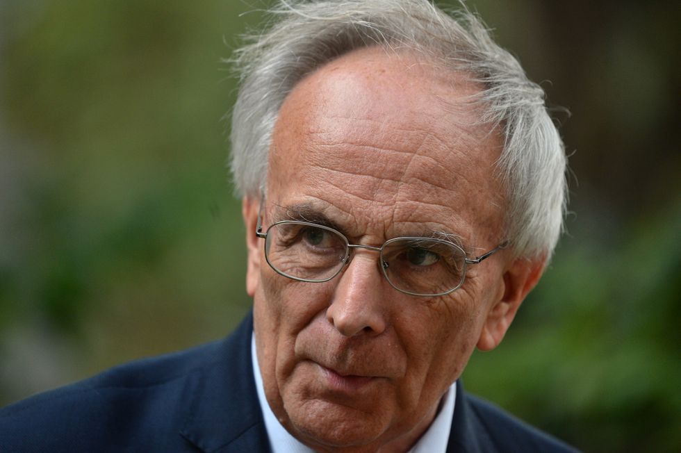 Peter Bone speaks to the media outside the Houses of Parliament in Westminster, London.
