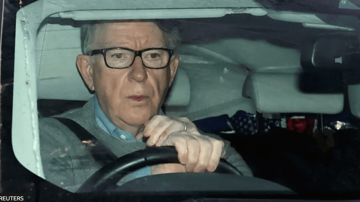 Peter Mandelson driving