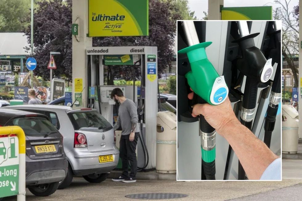 Petrol station and a man holding a fuel pump