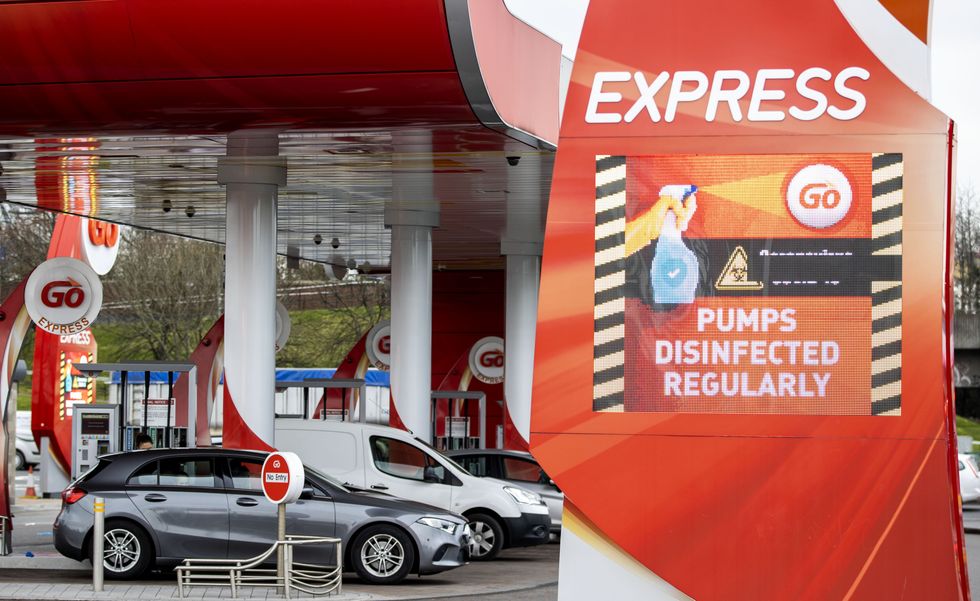 Petrol station warning notice during the pandemic