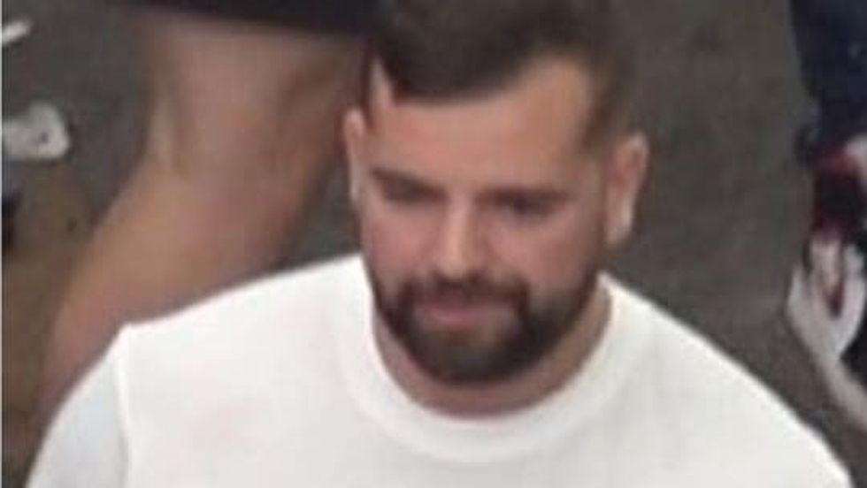 Photo issued by the Metropolitan Police of a man wanted in connection with violence and disorder that took place during the Euro 2020 final in London on Sunday July 11
