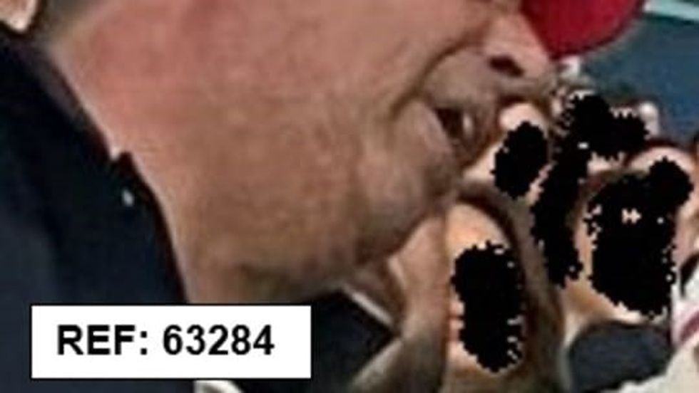 Photo issued by the Metropolitan Police of a man wanted in connection with violence and disorder that took place during the Euro 2020 final in London on Sunday July 11