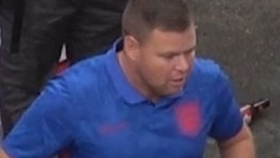 Photo issued by the Metropolitan Police of a man wanted in connection with violence and disorder that took place during the Euro 2020 final in London on Sunday July 11. Issue date: Saturday July 17, 2021.