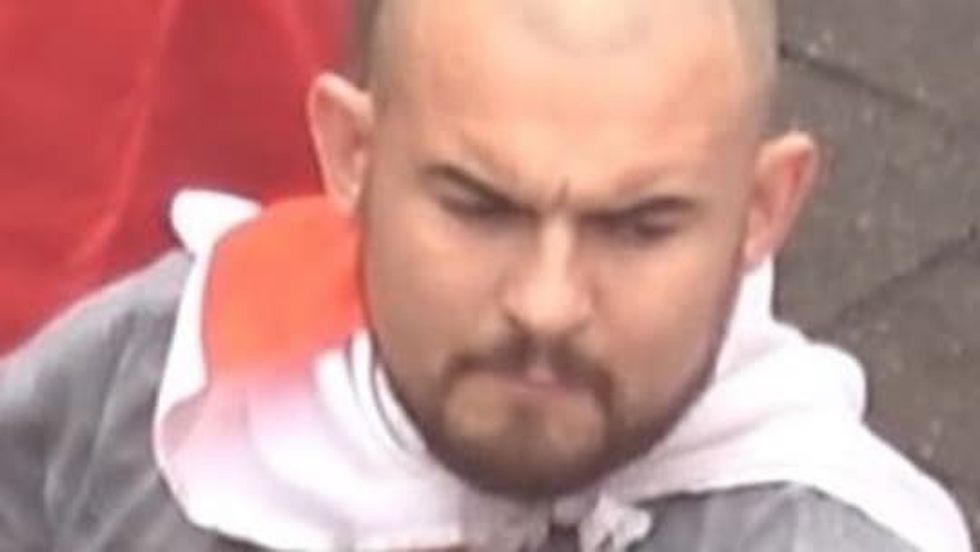 Photo issued by the Metropolitan Police of a man wanted in connection with violence and disorder that took place during the Euro 2020 final in London on Sunday July 11