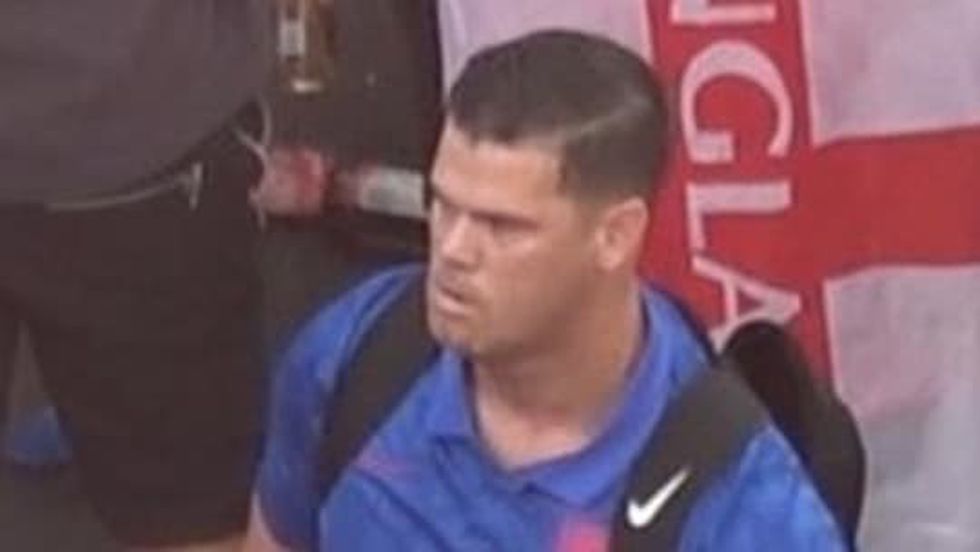Photo issued by the Metropolitan Police of a man wanted in connection with violence and disorder that took place during the Euro 2020 final in London on Sunday July 11