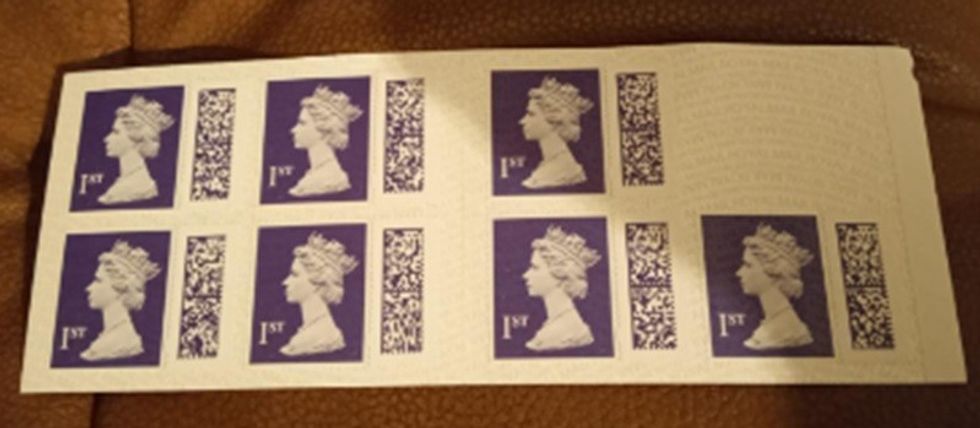 Photo of stamp book used to send stamp to Lorraine Hewitt