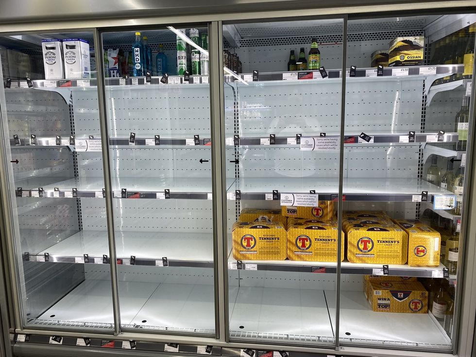 Photo taken with permission from the Twitter feed of @HapG86 of empty shelves in a Co-op. The shop replied to the Twitter user putting the low stock down to how many staff were self-isolating.