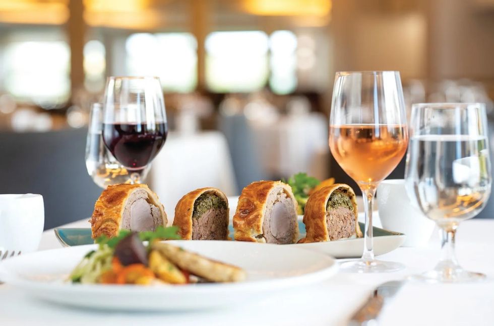 Piccadilly's wellington and wine on table