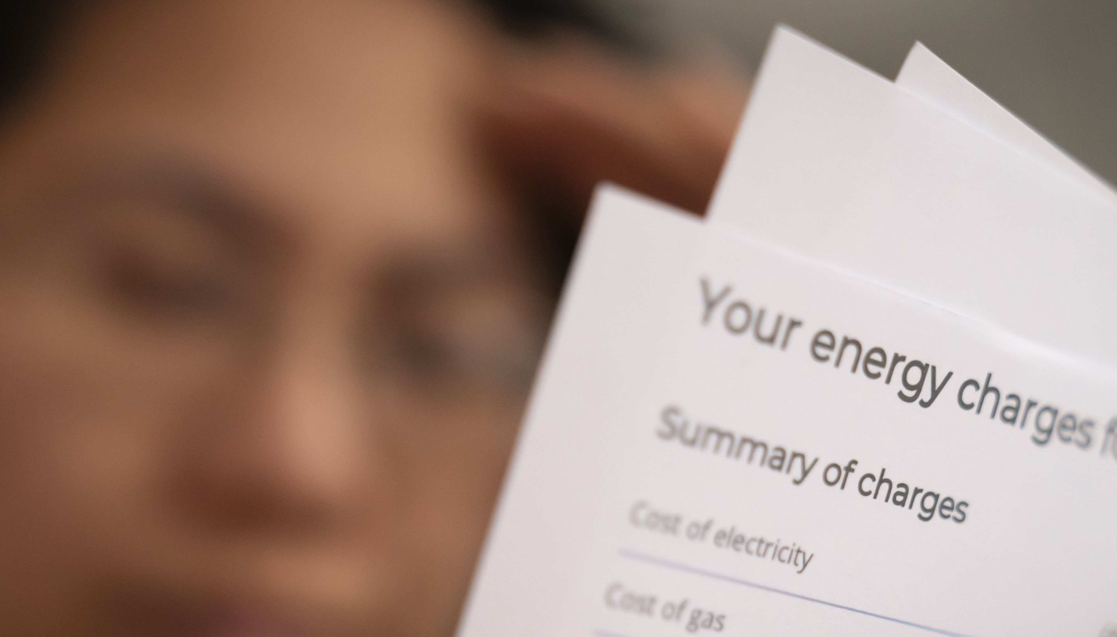 PICTURE POSED BY MODEL A person holding an energy bill. A green Tory group have urged ministers to help ease the cost of living crisis by shifting an environmental levy away from electricity bills and onto the Treasury. Picture date: Saturday January 8, 2022. The Government is under increasing pressure to act, with experts predicting a 50% hike to bills in April, meaning an average household paying around 700 more per year.
