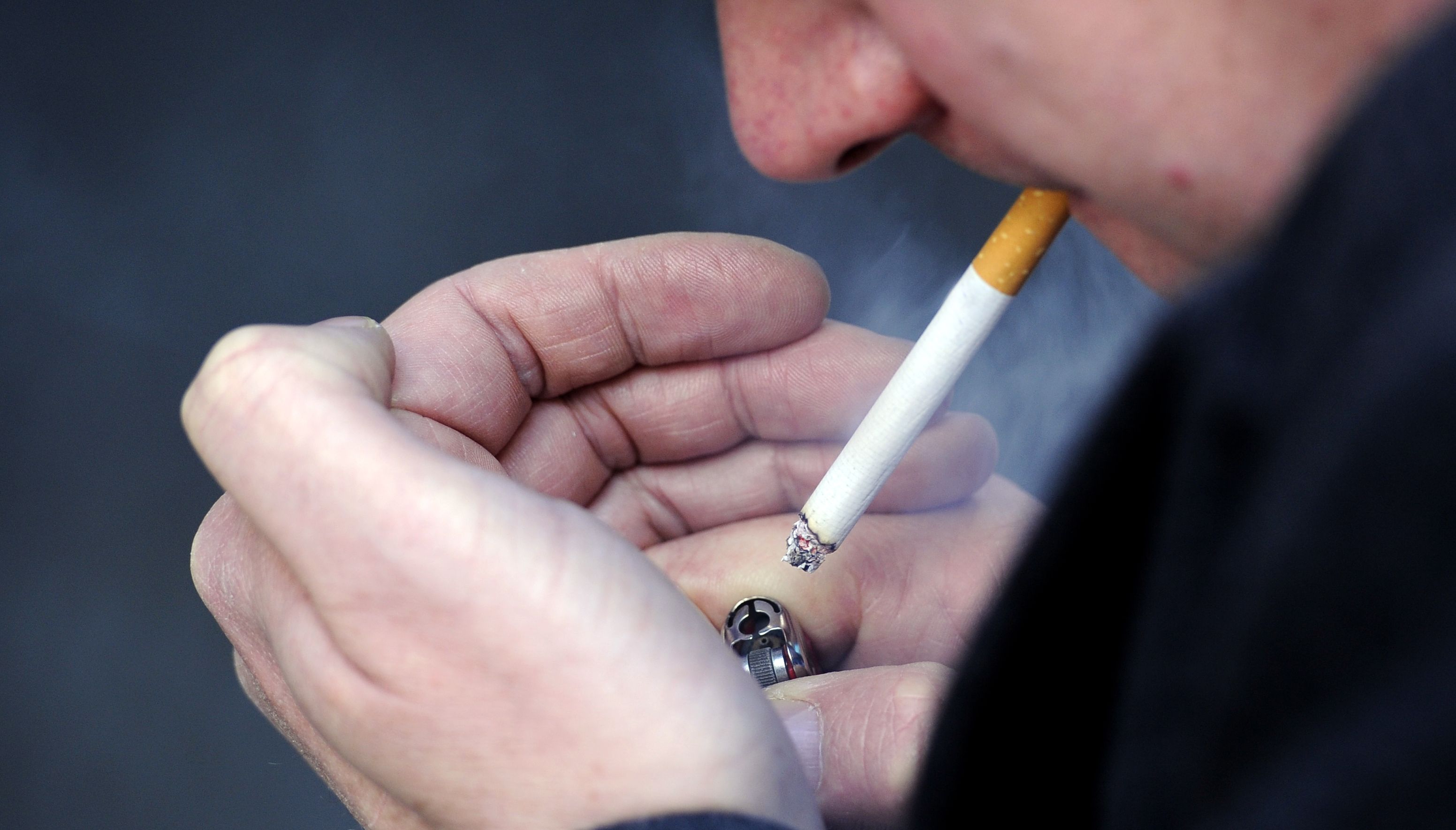 PICTURE POSED MY A MODEL: File photo dated 12/03/13 of a man smoking a cigarette. More must be done to help smokers in hospital kick the habit, a new review has concluded after it found that less than 1% of smokers manage to quit after a hospital stay. Issue date: Wednesday June 8, 2022.