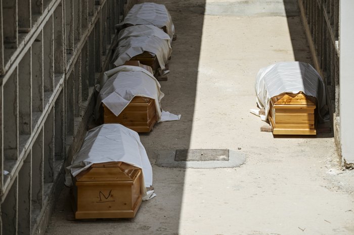 PICTURED: Some of the coffins of the migrants who died at sea last year attempting to cross the Mediterranean