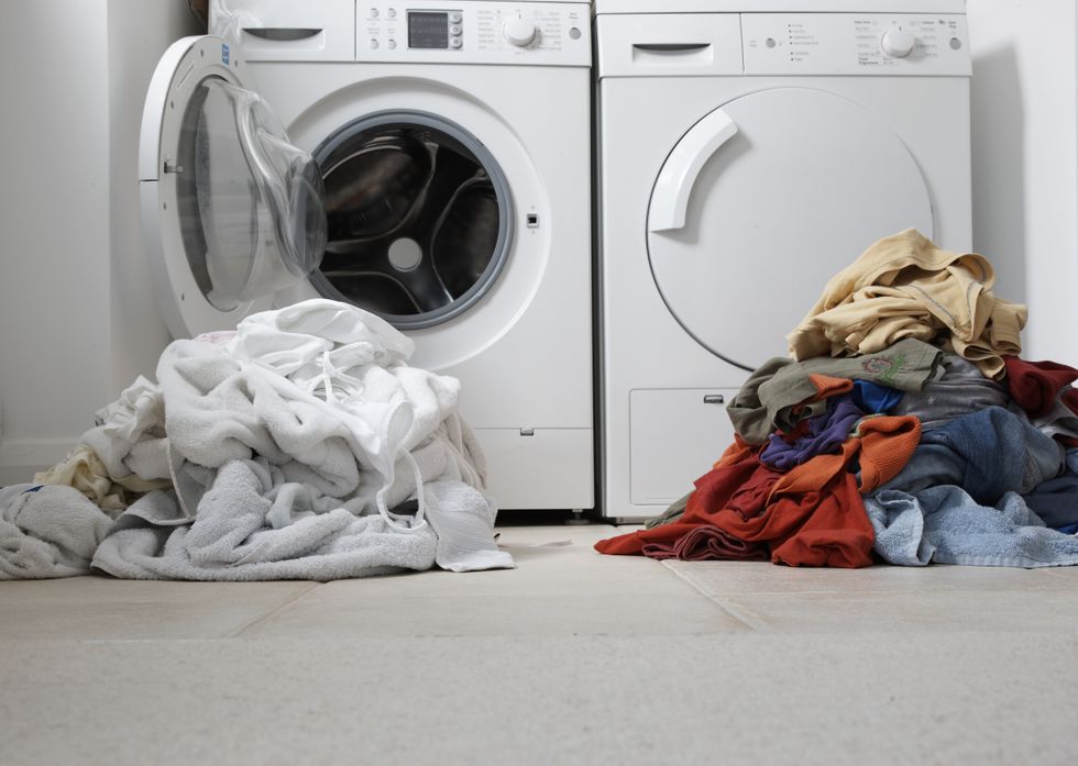 Piles of washing by washing machine in pictures