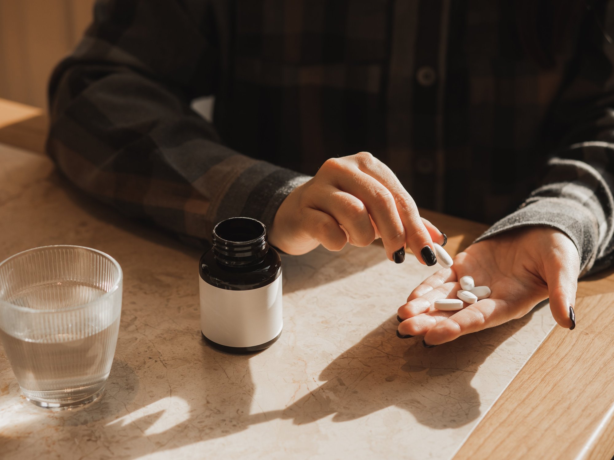 PILLS IN HAND