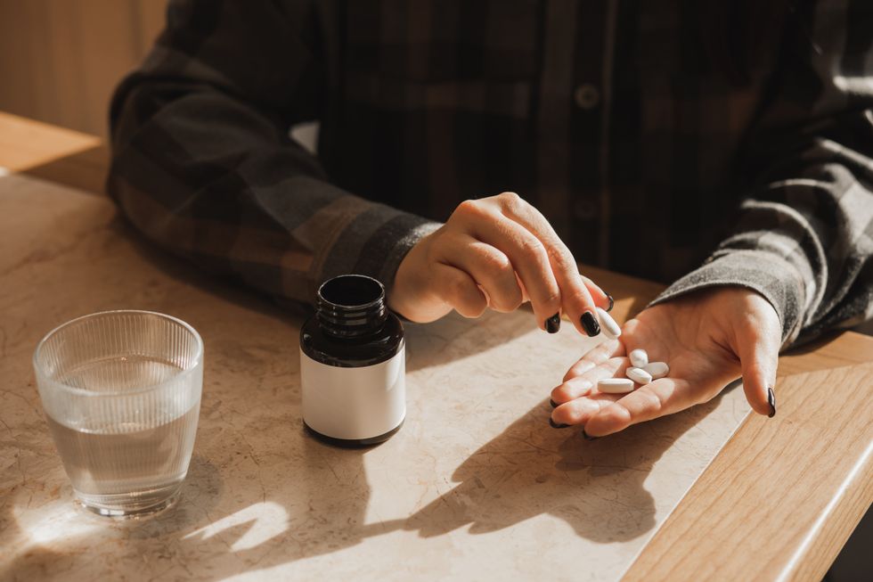 PILLS IN HAND