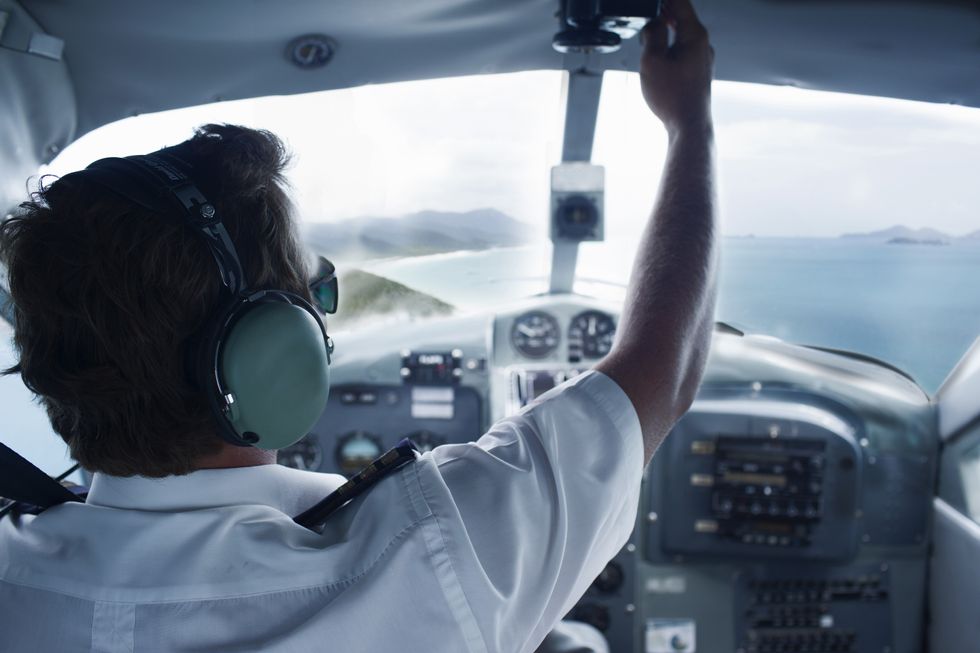 Pilot in cockpit of seaplane