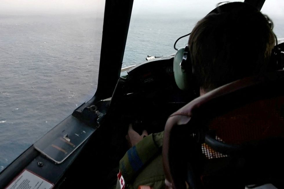 pilot scanning ocean