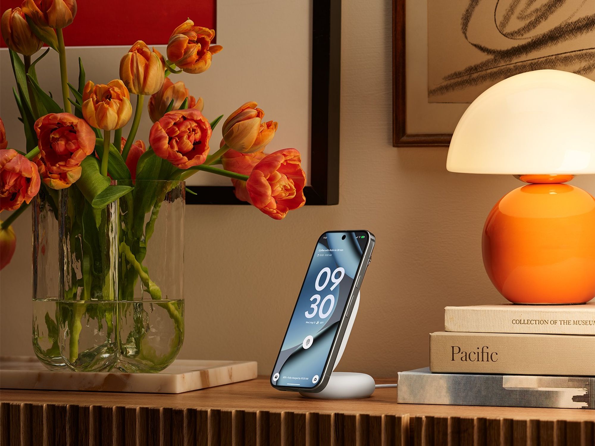 pixel 10 smartphone shown on the pixelsnap stand