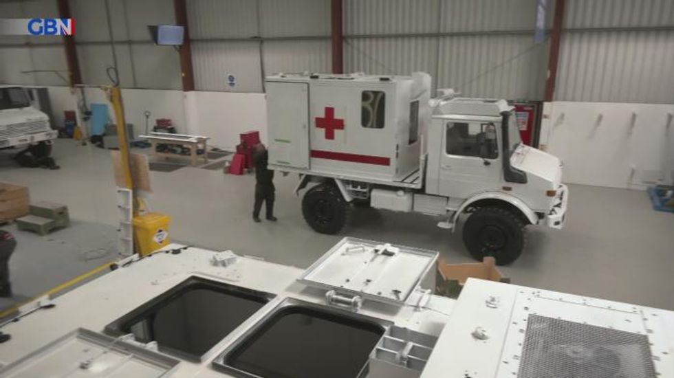 NHS ambulance supplier suspends production to help convert armoured vehicles in Ukrainian war effort