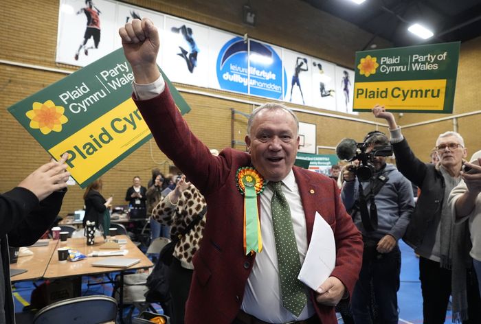 Plaid Cymru's Lindsay Whittle celebrates after being declared winner for the Caerphilly Senedd by-election