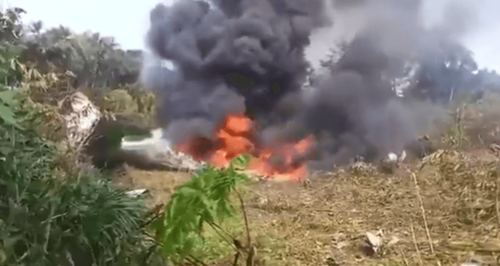 Plane crash site in flames in Puerto Legu\u00edzamo