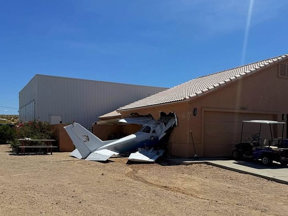 Plane crashes into garage in Arizona