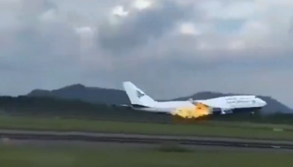 Plane engine bursts into flames