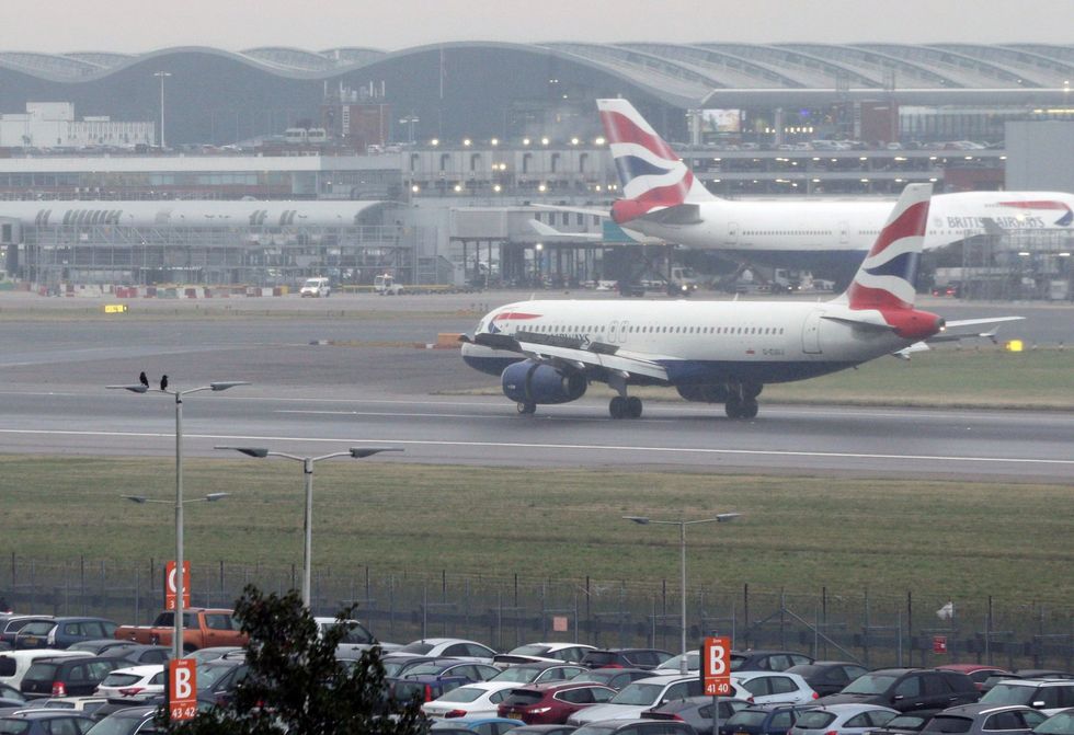 Planes on the runway at Heathrow Airport