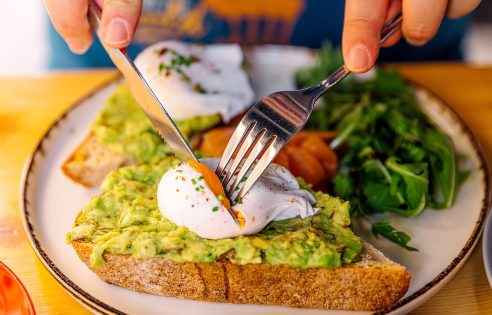 Poached eggs on toast with avocado