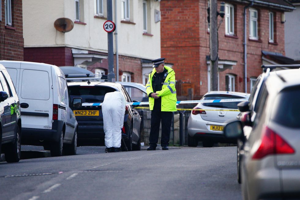 Police and forensic investigators at the scene in south Bristol