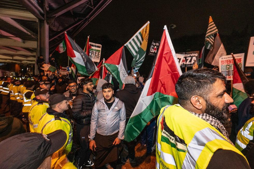 Police and protestors outisde Villa Park