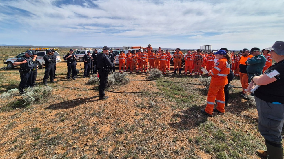Police and volunteers looking for Gus Lamont