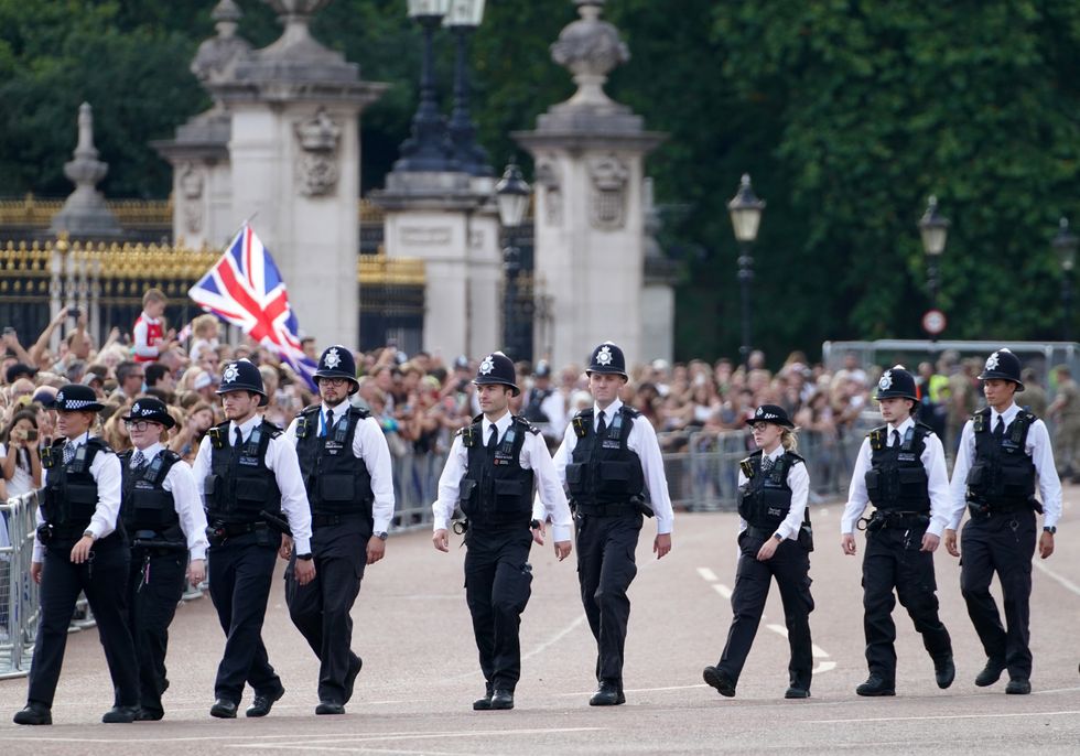 Police are seen outside of Buckingham Palace, London, following the death of Queen Elizabeth II on Thursday. Picture date: Saturday September 11, 2022.