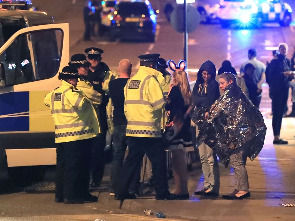 Police at the Manchester Arena at the end of a concert by US star Ariana Grande